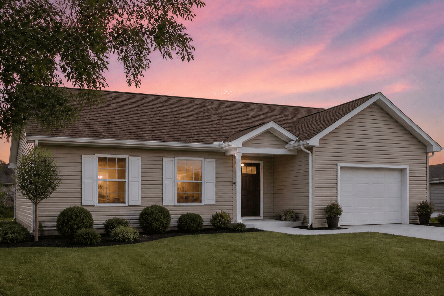 Beige ranch with a worn asphalt roof